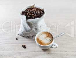 Espresso cup and coffee beans