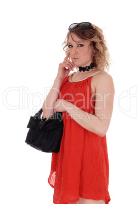 Pretty young woman in red dress.