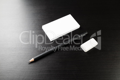 Business cards, pencil and eraser