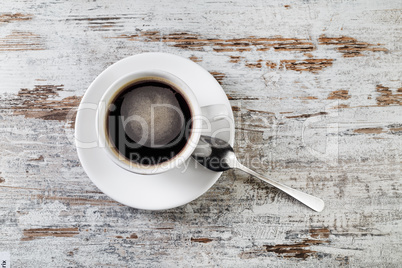 Coffee cup and spoon