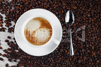 Coffee cup and coffee beans