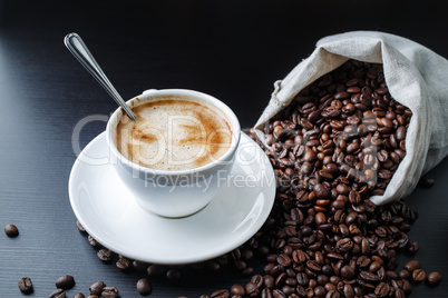 Coffee cup and beans