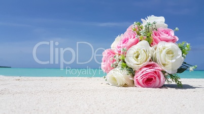 v01023 Maldives beautiful beach background white sandy tropical paradise island with blue sky sea water ocean 4k bouquet flowers pink