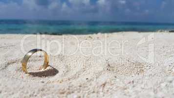 v01029 Maldives beautiful beach background white sandy tropical paradise island with blue sky sea water ocean 4k gold wedding ring