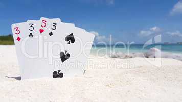 v01197 Maldives beautiful beach background white sandy tropical paradise island with blue sky sea water ocean 4k playing cards threes