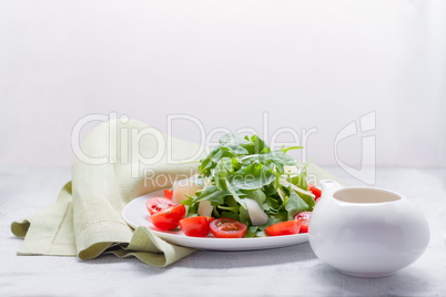 Salad with arugula, tomatoes