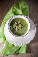 A bowl of creamy broccoli soup
