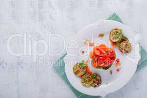 Rice timbale with fried zucchini, peppers and carrots