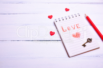 Notepad with the inscription red love