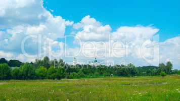 view to Chernihiv town with beautiful Troizkiy monastery and field