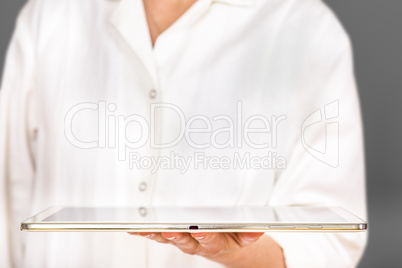 Person holding tablet pc