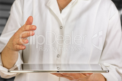 Person holding tablet pc