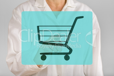 Person pointing with finger on shopping cart