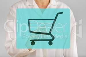 Person pointing with finger on shopping cart