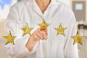 Person pointing with finger at stars