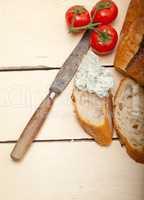 fresh blue cheese spread ove french baguette