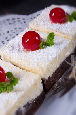 chocolate cream cake with cherries