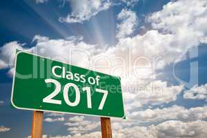 Class of 2017 Green Road Sign with Dramatic Clouds and Sky