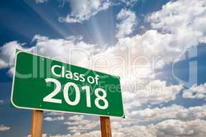 Class of 2018 Green Road Sign with Dramatic Clouds and Sky