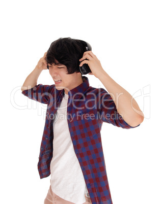 Asian man listen to music.