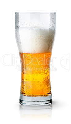 Half glass of light beer with foam