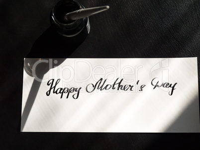 Happy Mother's day calligraphy and lattering post card. Sunlight from window.