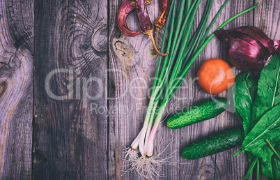 Fresh vegetables on a gray wooden surface