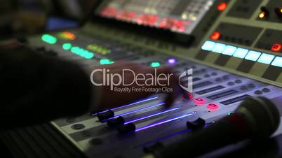 Professional audio console in a concert, sound mixer console during a concert