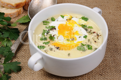 potato cream soup with poached eggs