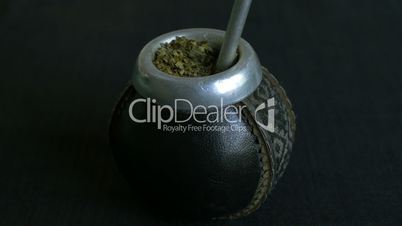 Full shot of pouring hot water in mate