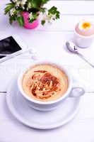 cup of coffee, egg and mobile phone