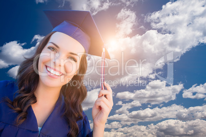 Happy Graduating Mixed Race Woman In Cap and Gown
