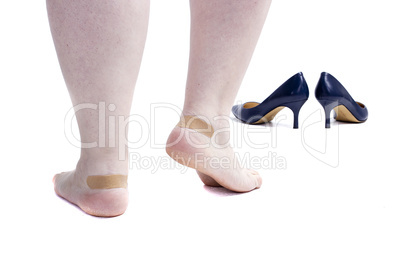 Legs with plaster and shoes