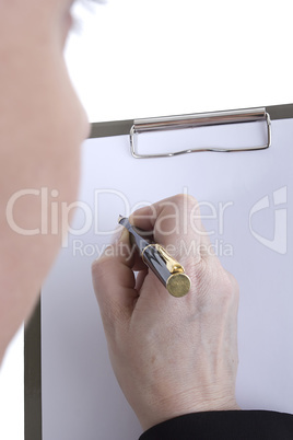 Hands with sheet of paper on clipboard
