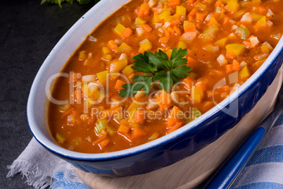 fish with vegetables in tomato sauce