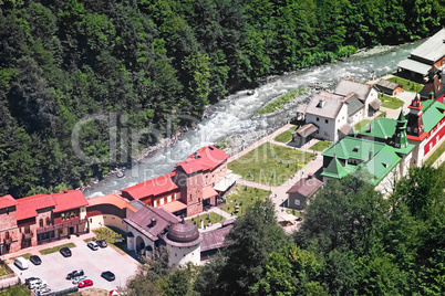 Hotel complex in the mountains near the river.