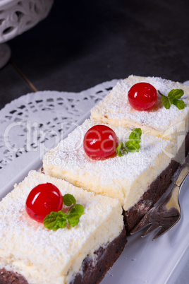 chocolate cream cake with cherries