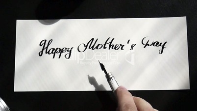 Happy Mother's day calligraphy and lattering post card. Top view. Sunlight.