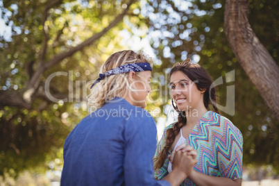 Close up of romantic couple holding hands