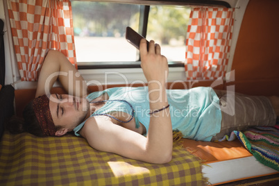 Man using phone in van