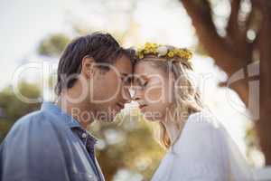 Romantic couple against tree