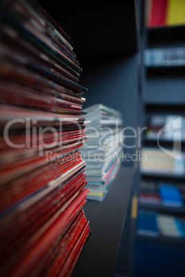 Stack of books on shelf at school