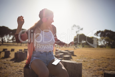 Young woman listening to music