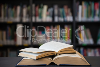 Close up of open books on table