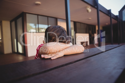 Close up of boy relaxing at table