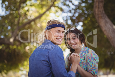 Portrait of romantic couple holding hands