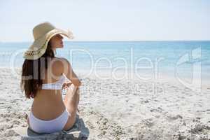 Rear view of woman wearing sun hat