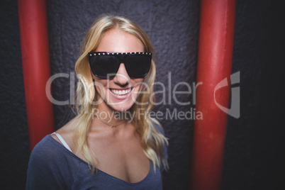 Close up portrait of woman wearing sunglasses