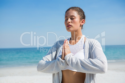 Close up of woman in prayer position