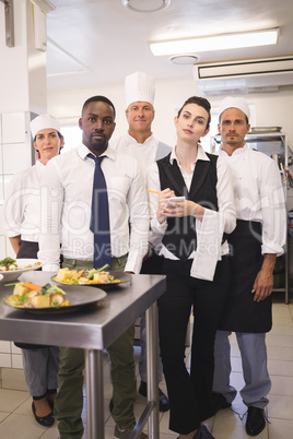 Restaurant manager with his kitchen staff